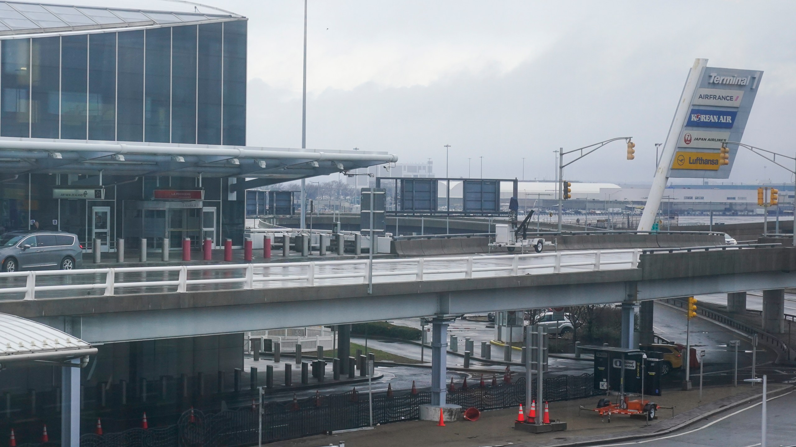 FILE - A vehicle stops at Terminal 1 at John F. Kennedy International Airport in New York, Feb. 17, 2023. (AP Photo/Seth Wenig, File)