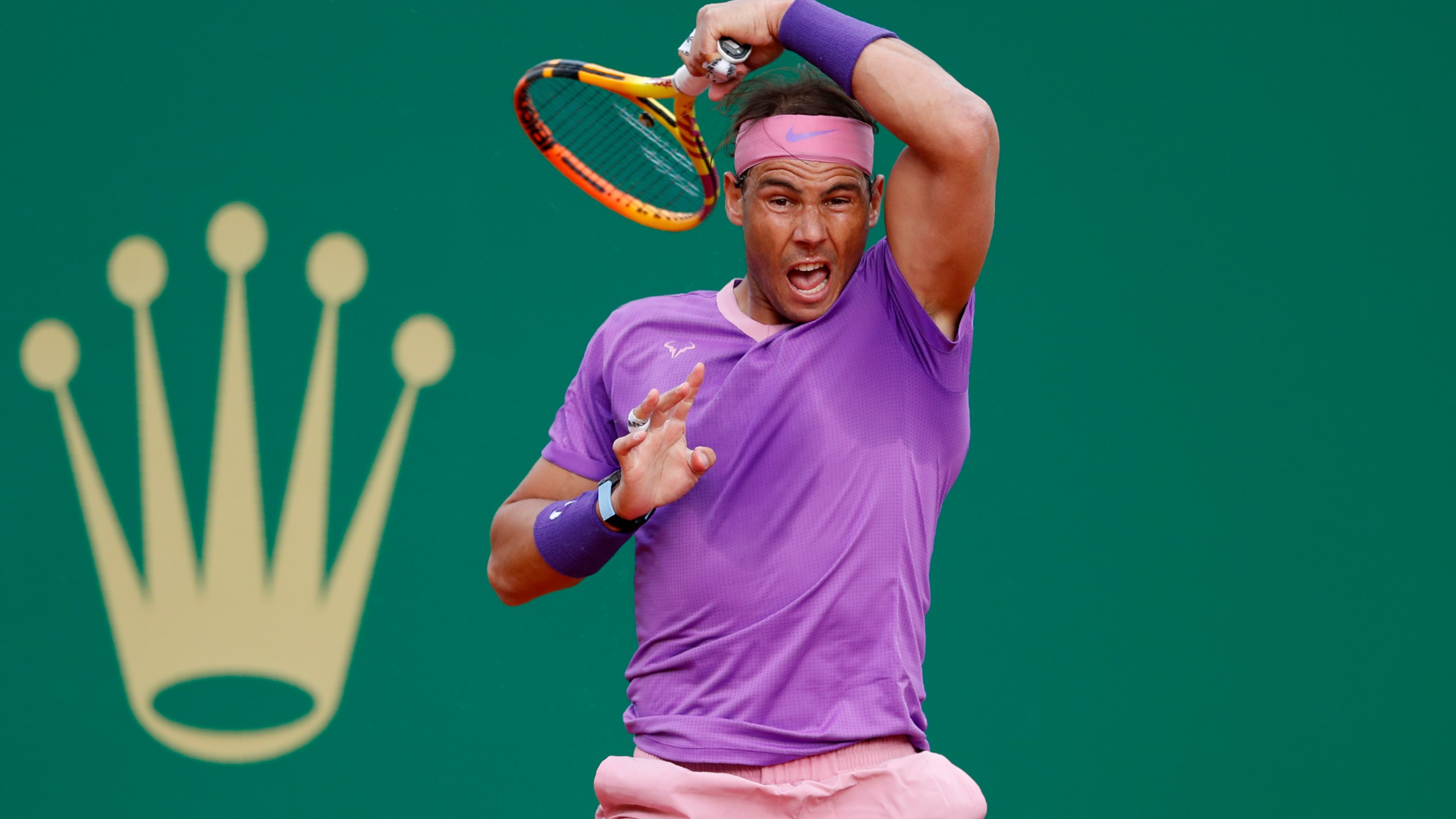 Rafael Nadal of Spain follows his shot to Andrey Rublev of Russia during their quarterfinal match of the Monte Carlo Tennis Masters tournament in Monaco, Friday, April 16, 2021. (AP Photo/Jean-Francois Badias)