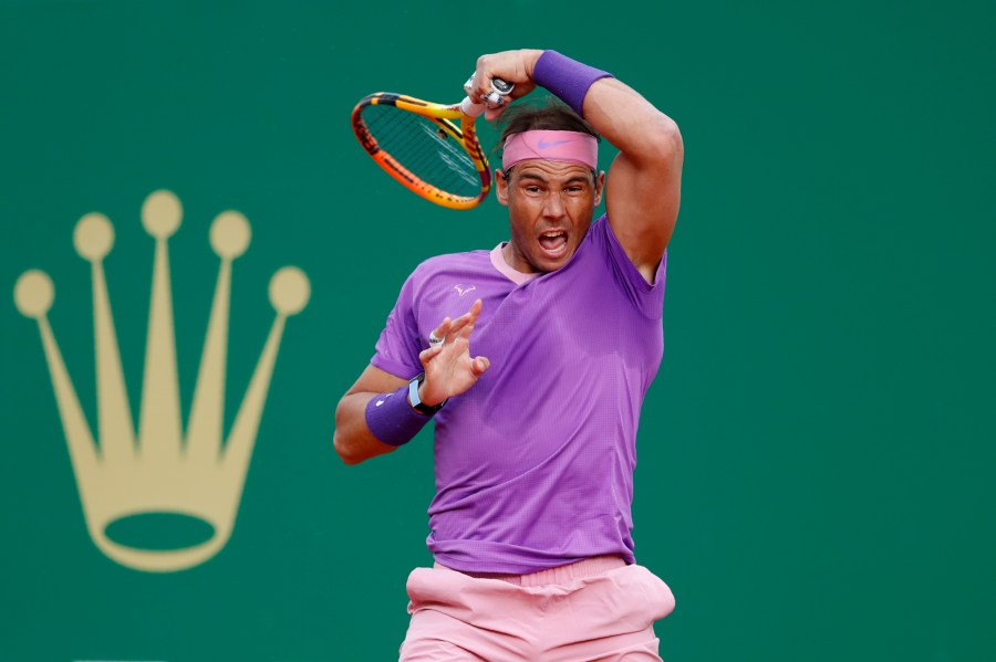 Rafael Nadal of Spain follows his shot to Andrey Rublev of Russia during their quarterfinal match of the Monte Carlo Tennis Masters tournament in Monaco, Friday, April 16, 2021. (AP Photo/Jean-Francois Badias)