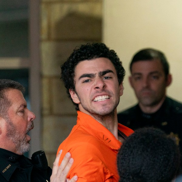 Suspect Luigi Mangione is taken into the Blair County Courthouse on Tuesday, Dec. 10, 2024, in Hollidaysburg, Pa. (Benjamin B. Braun/Pittsburgh Post-Gazette via AP)