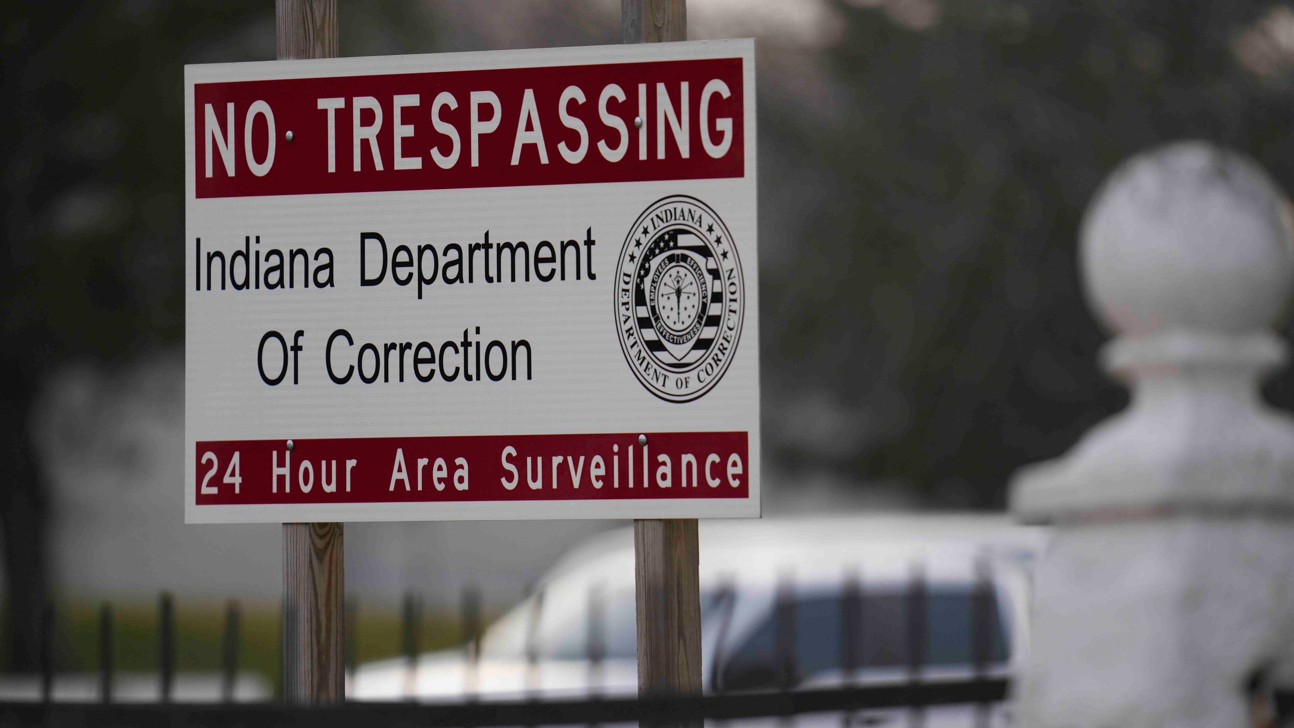 A sign is posted outside of Indiana State Prison where, barring last-minute court action or intervention by Gov. Eric Holcomb, Joseph Corcoran, 49, convicted in the 1997 killings of his brother and three other people, is scheduled to be put to death by lethal injection before sunrise Tuesday, Dec. 17, 2024, in Michigan City, Ind. (AP Photo/Erin Hooley)