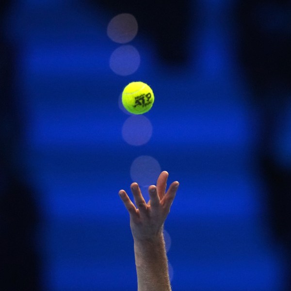 FILE- Italy's Jannik Sinner serves the ball to Russia's Daniil Medvedev during their singles tennis match of the ATP World Tour Finals at the Inalpi Arena, in Turin, Italy, Thursday, Nov. 14, 2024. (AP Photo/Antonio Calanni, File)