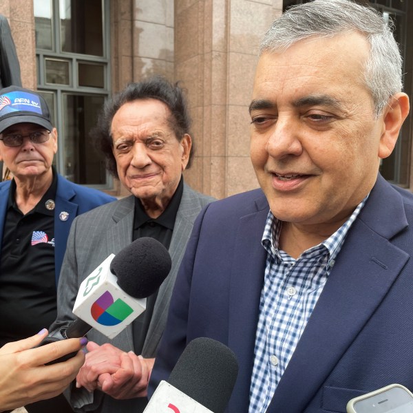 FILE - Former U.S. Rep. David Rivera speaks with media outside Miami federal court, in Miami, Dec. 20, 2022. (AP Photo/Joshua Goodman, File)