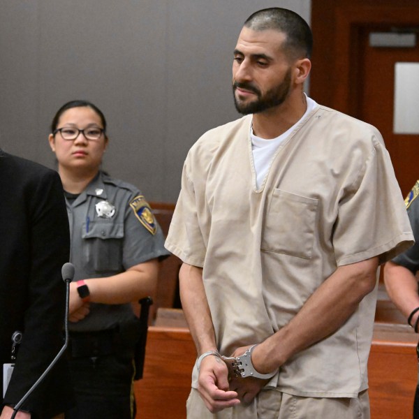 FILE - Dennis Hernandez, the troubled brother of the late New England Patriots tight end Aaron Hernandez, stands with his public defender Sandra Crowell during his arraignment, Aug. 1, 2023, at Connecticut Superior Court in New Britain, Conn. (Douglas Healey/New York Post via AP, Pool, File)