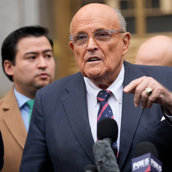 FILE - Rudy Giuliani speaks to reporters as he leaves the federal courthouse in New York, Nov. 26, 2024. (AP Photo/Seth Wenig, File)