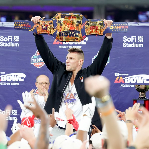 Former NFL tight end Rob Gronkowski holds up the LA Bowl belt after UNLV's victory over California during the LA Bowl NCAA college football game Wednesday, Dec. 18, 2024, in Inglewood, Calif. (AP Photo/Ryan Sun)