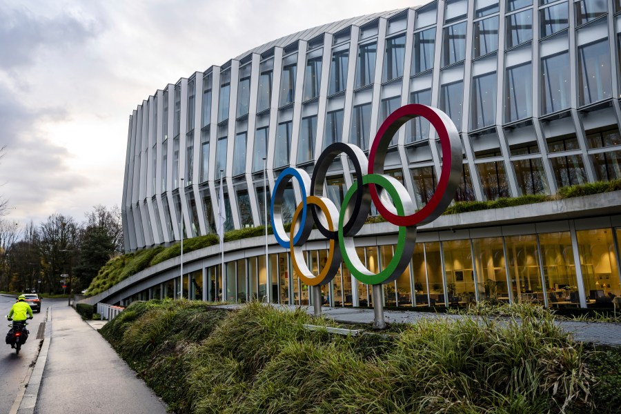 The Olympic rings are pictured front of the Olympic House before the opening of the executive board meeting of the IOC, in Lausanne, Switzerland, Tuesday, Dec. 3, 2024. (Jean-Christophe Bott/Keystone via AP)