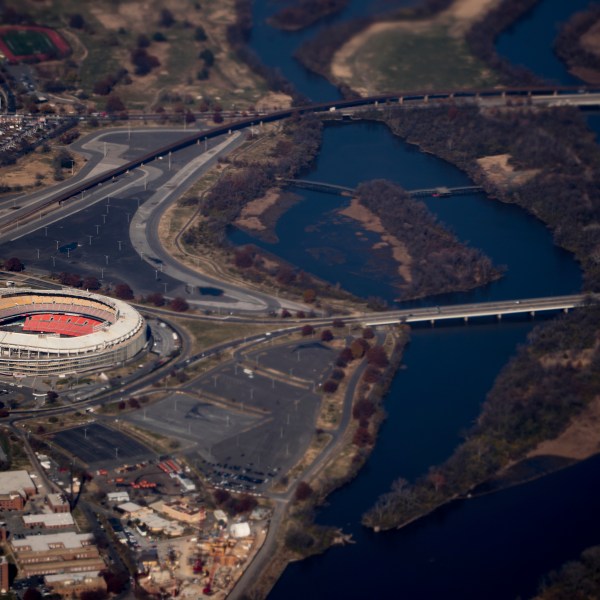 FILE - RFK Stadium is visible from Air Force One as it takes off from Andrews Air Force Base, Md., Wednesday, Nov. 29, 2017, as President Donald Trump flies to St. Louis to speak at a tax reform rally. (AP Photo/Andrew Harnik, File)