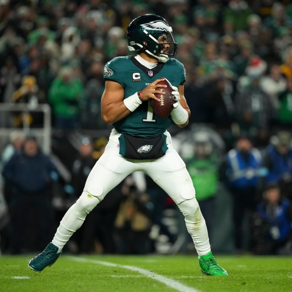 Philadelphia Eagles quarterback Jalen Hurts looks to pass during the first half of an NFL football game against the Pittsburgh Steelers on Sunday, Dec. 15, 2024, in Philadelphia. (AP Photo/Matt Slocum)