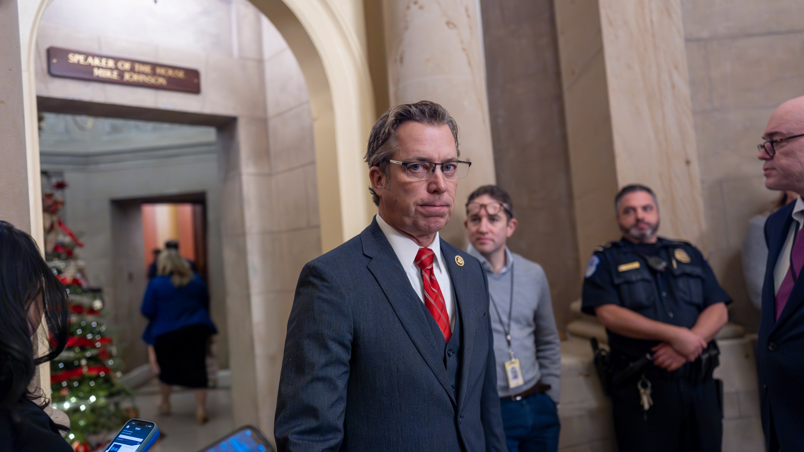 Rep. Andy Ogles, R-Tenn., arrives for a meeting with Speaker of the House Mike Johnson, R-La., at the Capitol in Washington, Friday, Dec. 20, 2024. (AP Photo/J. Scott Applewhite)