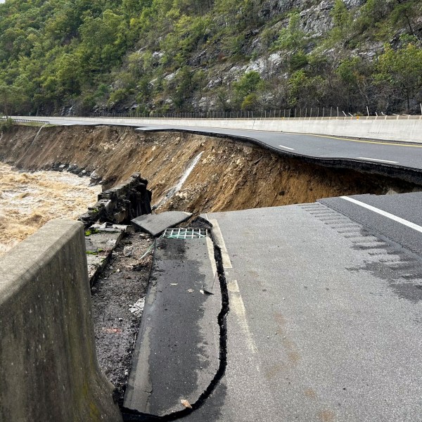 FILE - This photo provided by the North Carolina Department of Transportation shows the collapsed eastbound lane of I-40 into the Pigeon River in North Carolina near the Tennessee border, Sept. 28, 2024. (N.C. Department of Transportation via AP, File)