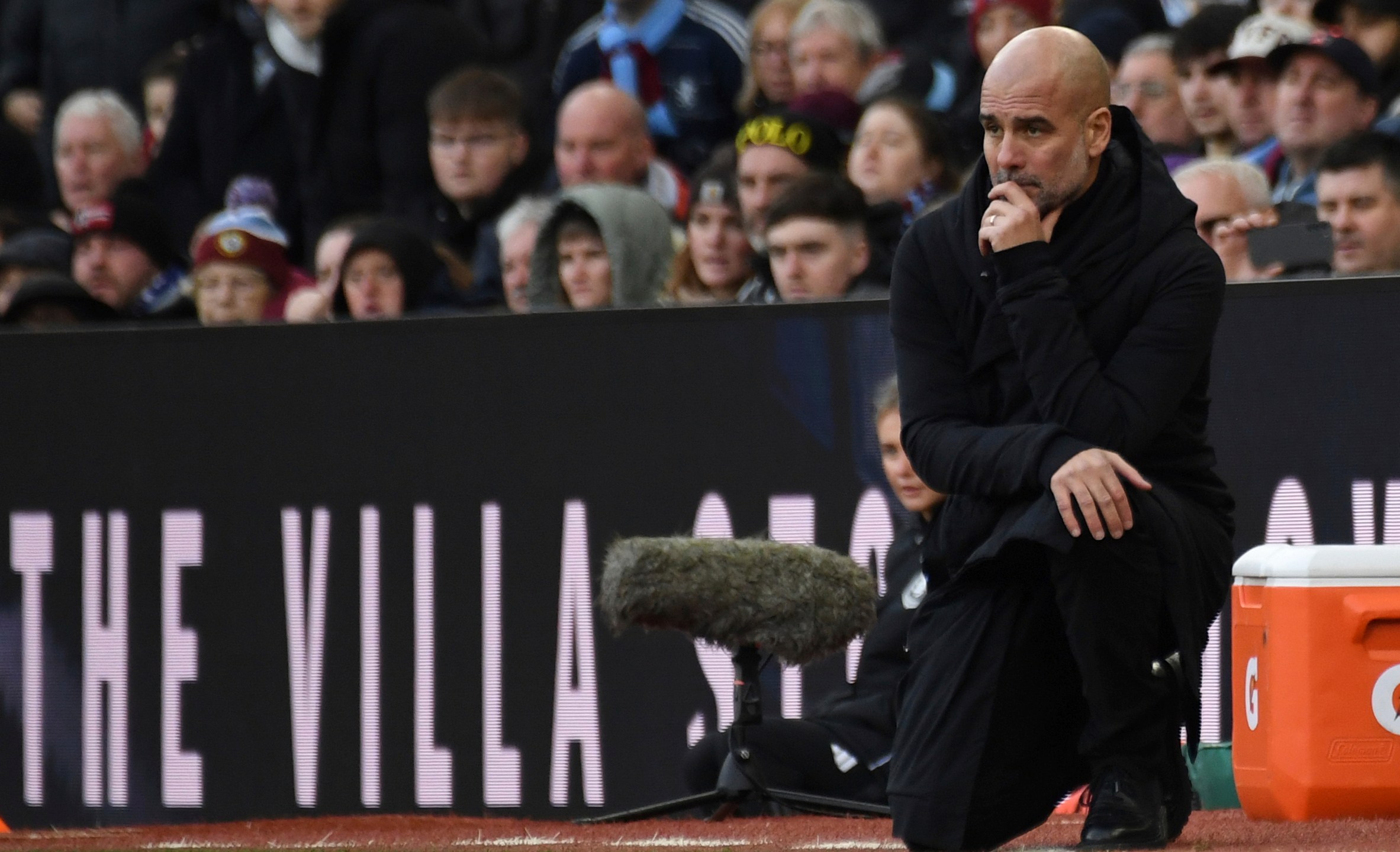 Manchester City's head coach Pep Guardiola reacts during the English Premier League soccer match between Aston Villa and Manchester City, at Villa Park in Birmingham, England, Saturday, Dec. 21, 2024. (AP Photo/Rui Vieira)