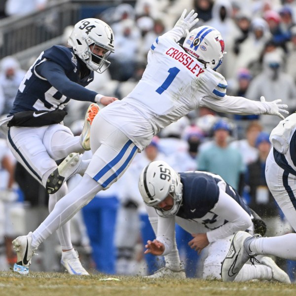 Penn State kicker Ryan Barker (94) kicks a field goal during the second half against SMU in the first round of the NCAA College Football Playoff, Saturday, Dec. 21, 2024, in State College, Pa. (AP Photo/Barry Reeger)