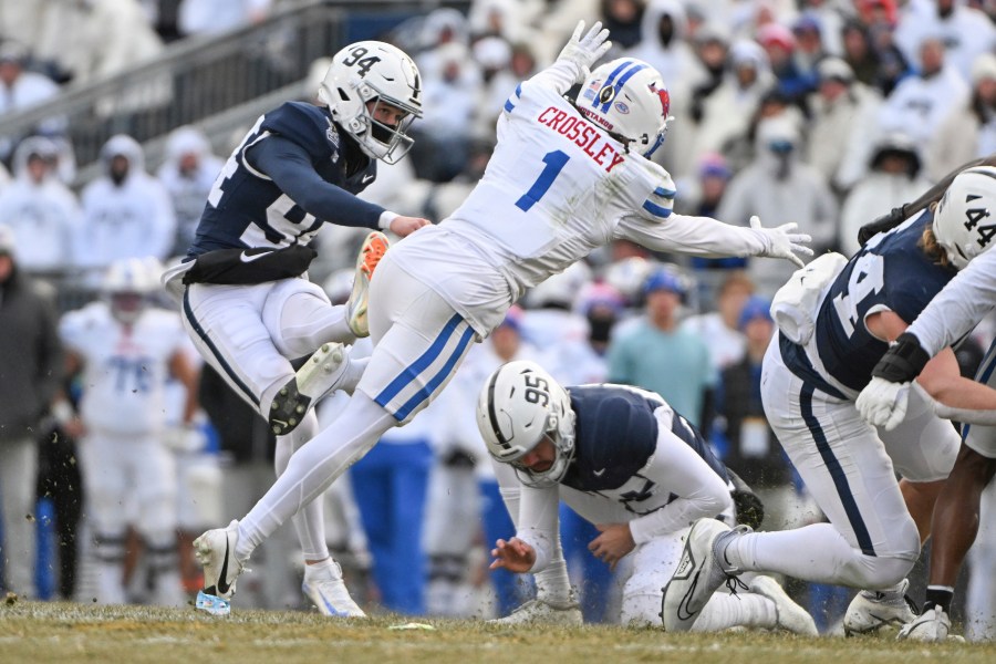 Penn State kicker Ryan Barker (94) kicks a field goal during the second half against SMU in the first round of the NCAA College Football Playoff, Saturday, Dec. 21, 2024, in State College, Pa. (AP Photo/Barry Reeger)