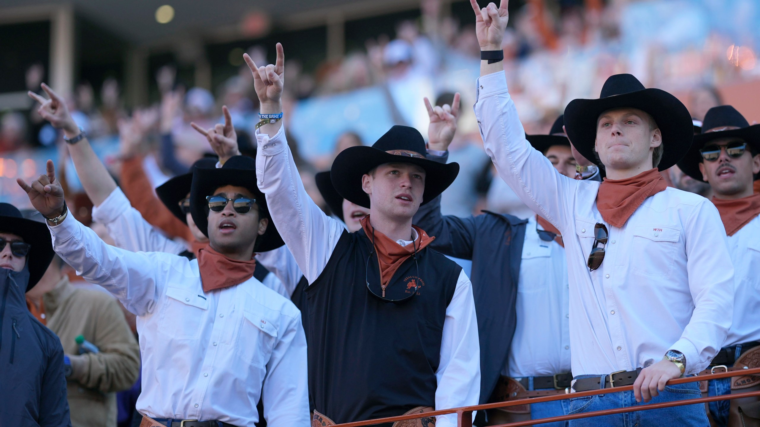 Texas fans cheer during the first half of a first round game against Clemson in the College Football Playoff, Saturday, Dec. 21, 2024, in Austin, Texas. (AP Photo/Eric Gay)