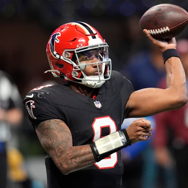 Atlanta Falcons quarterback Michael Penix Jr. (9) throws the ball in the second half of an NFL football game against the New York Giants in Atlanta, Sunday, Dec. 22, 2024. (AP Photo/Mike Stewart)