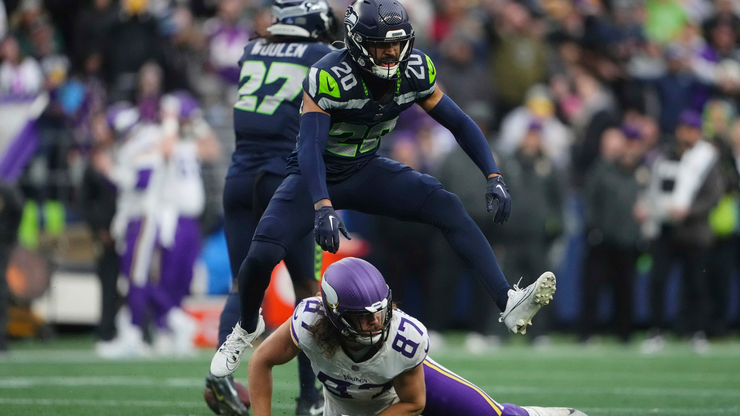 Seattle Seahawks safety Julian Love (20) celebrates after forcing a incomplete pass intended for Minnesota Vikings tight end T.J. Hockenson (87) during the second half of an NFL football game, Sunday, Dec. 22, 2024, in Seattle. (AP Photo/Lindsey Wasson)