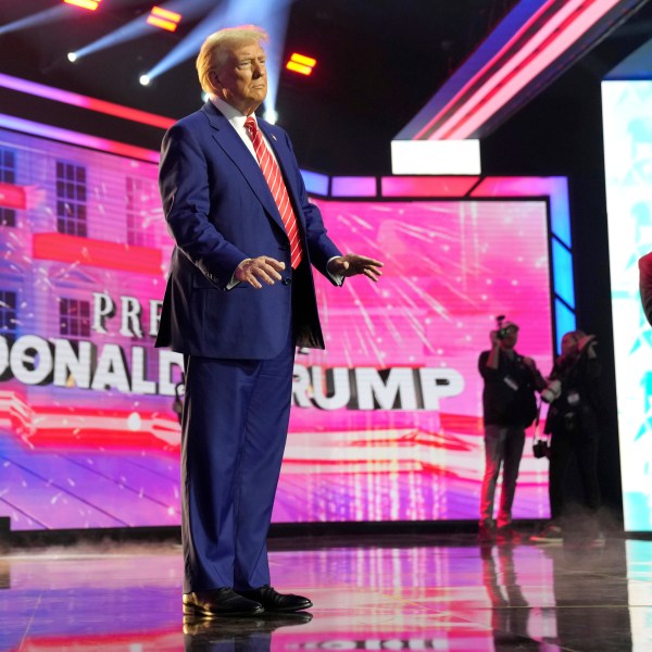 President-elect Donald Trump arrives to speak at AmericaFest, Sunday, Dec. 22, 2024, in Phoenix. (AP Photo/Rick Scuteri)