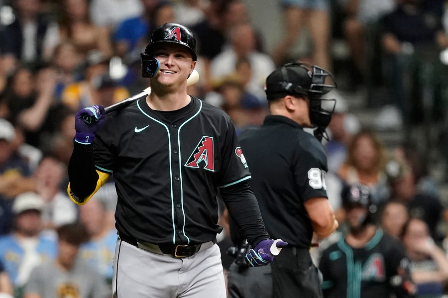 FILE - Arizona Diamondbacks' Joc Pederson smiles while at bat during the third inning of a baseball game against the Milwaukee Brewers, Sept. 21, 2024, in Milwaukee. (AP Photo/Aaron Gash, File)