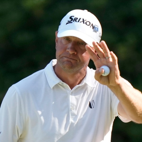 FILE - Lucas Glover waves after making a putt on the 13th hole during third round at the Masters golf tournament at Augusta National Golf Club Saturday, April 13, 2024, in Augusta, Ga. (AP Photo/Charlie Riedel, File)