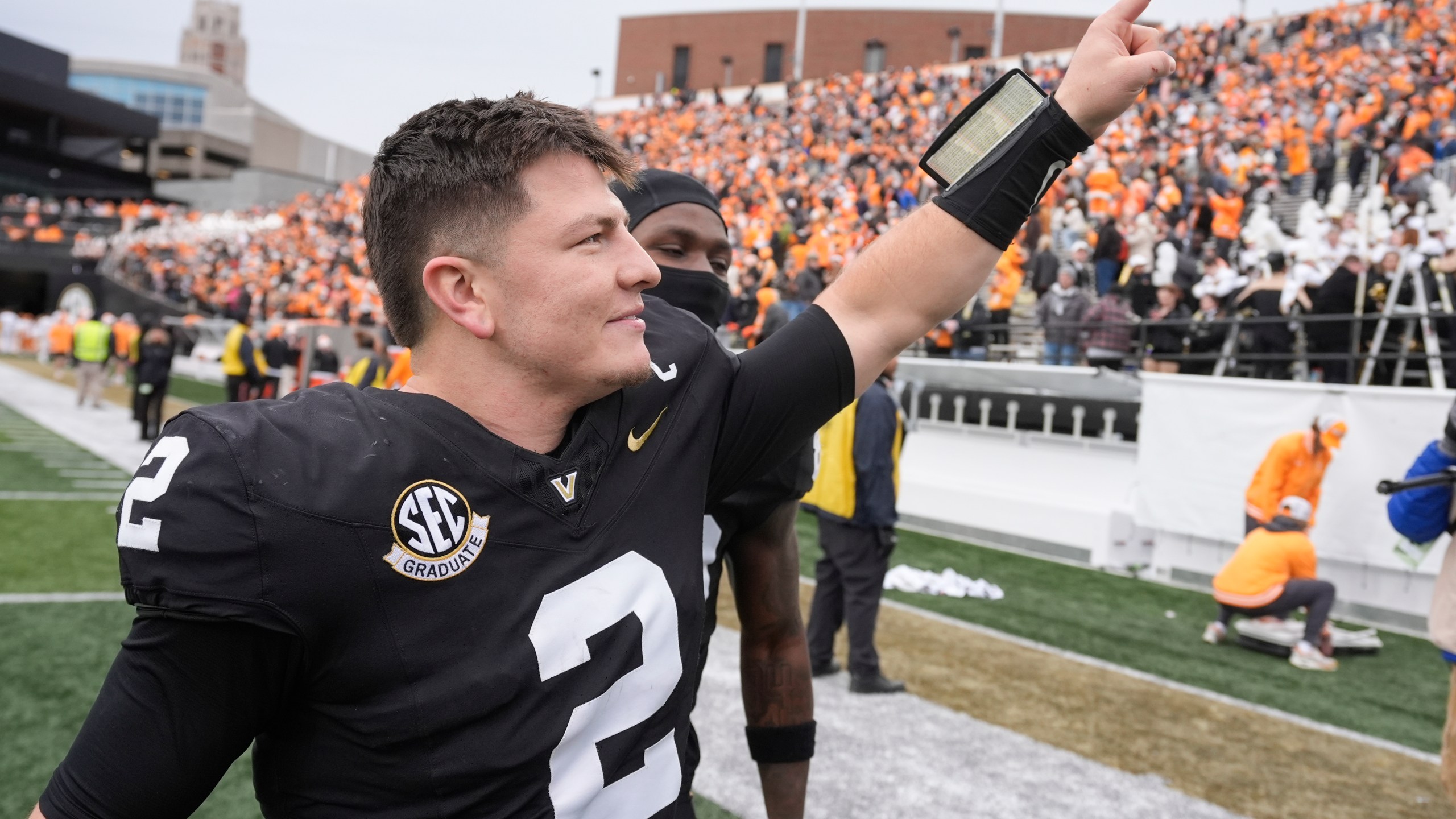 Vanderbilt quarterback Diego Pavia (2) waves to fans as he leaves the field after an NCAA college football game against Tennessee Saturday, Nov. 30, 2024, in Nashville, Tenn. Tennessee won 36-23. (AP Photo/George Walker IV)