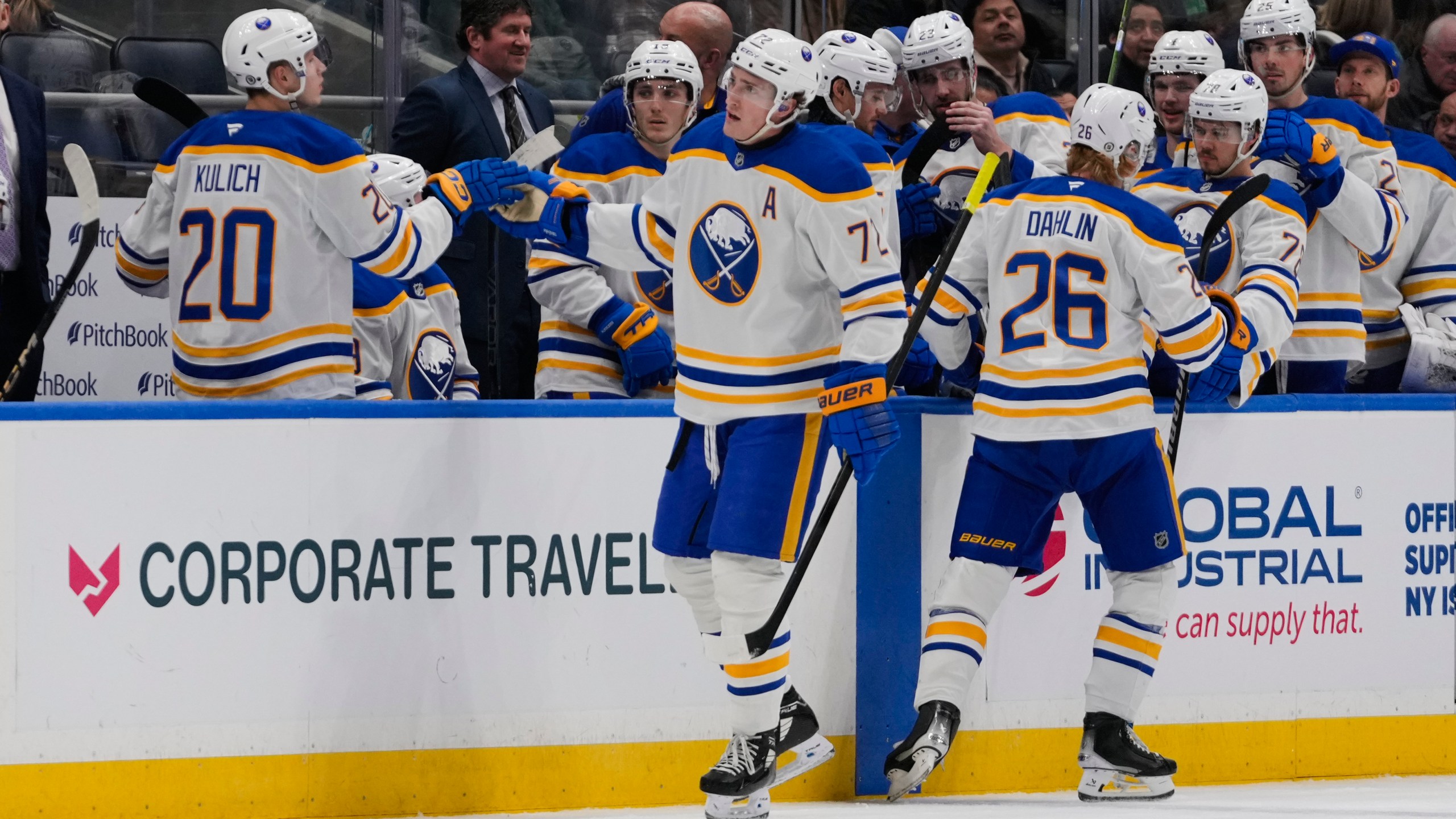 Buffalo Sabres' Tage Thompson (72) celebrates with teammates after scoring an empty-net goal during the third period of an NHL hockey game against the New York Islanders Monday, Dec. 23, 2024, in Elmont, N.Y. (AP Photo/Frank Franklin II)