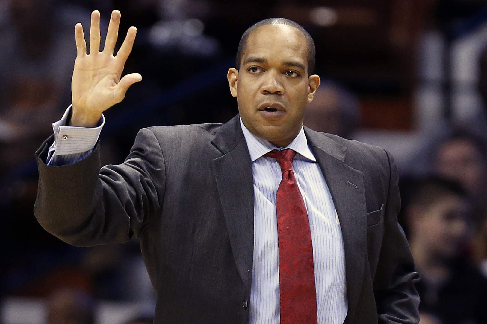 FILE - Fairfield head coach Sydney Johnson during the first half of an NCAA college basketball game against Louisville in the semifinal round of the Basketball Hall of Fame Tip-Off tournament at Mohegan Sun Arena in Uncasville, Conn., Nov. 23, 2013. (AP Photo/Michael Dwyer, File)