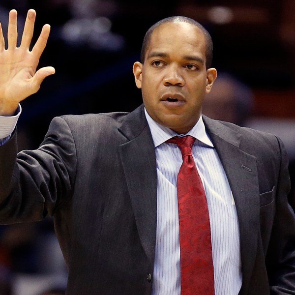 FILE - Fairfield head coach Sydney Johnson during the first half of an NCAA college basketball game against Louisville in the semifinal round of the Basketball Hall of Fame Tip-Off tournament at Mohegan Sun Arena in Uncasville, Conn., Nov. 23, 2013. (AP Photo/Michael Dwyer, File)