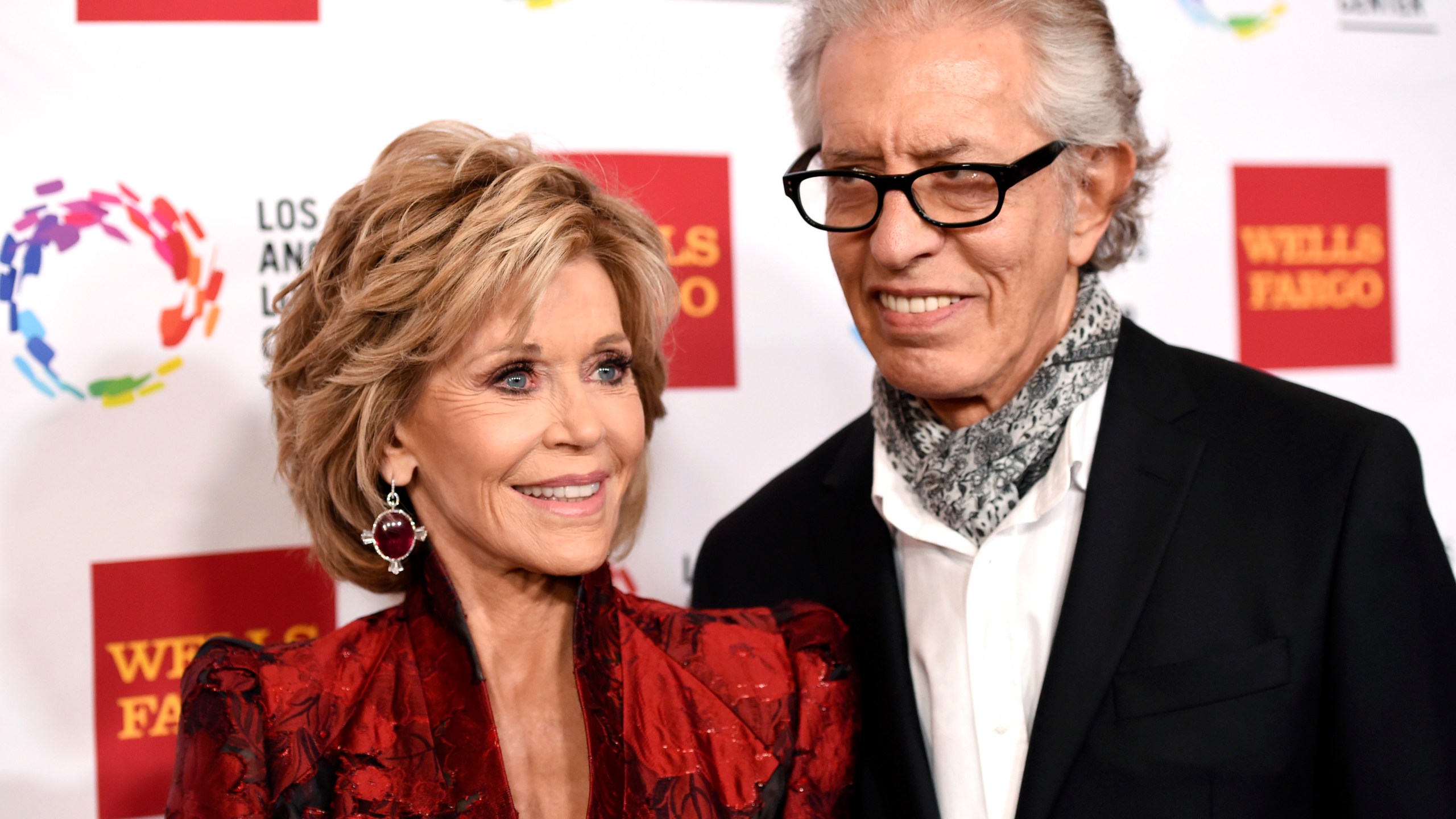 FILE - Jane Fonda, left, and Richard Perry pose for a photo at the Los Angeles LGBT Center's 46th Anniversary Gala Vanguard Awards at the Hyatt Regency Century Plaza in Los Angeles, Nov. 7, 2015. (Photo by Chris Pizzello/Invision/AP, File)