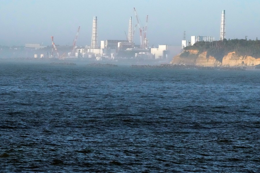 FILE - The Fukushima Daiichi nuclear power plant, damaged by a massive March 11, 2011, earthquake and tsunami, is seen from the nearby Ukedo fishing port in Namie town, northeastern Japan, Thursday, Aug. 24, 2023. (AP Photo/Eugene Hoshiko, File)