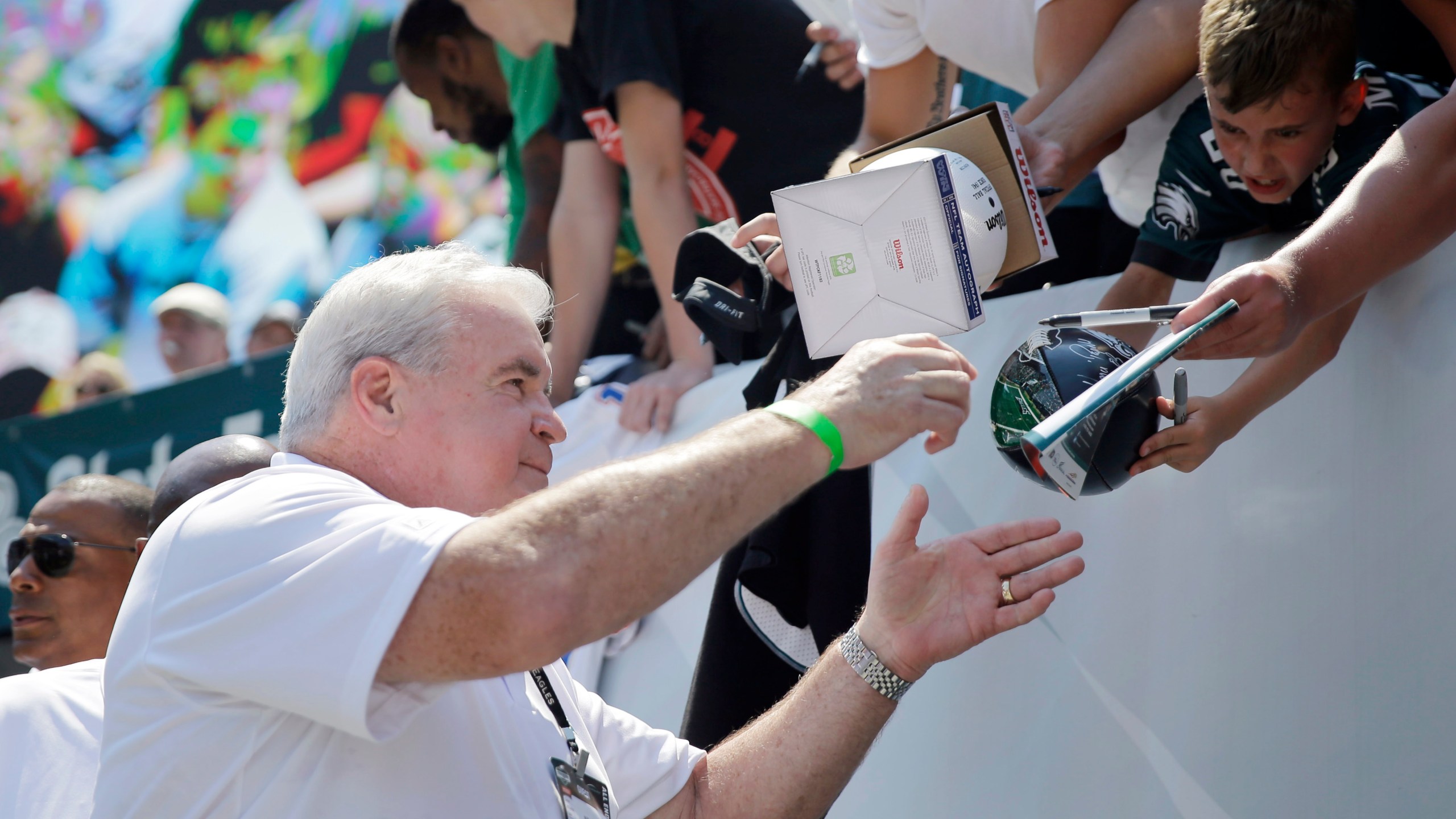 FILE - Former Philadelphia Eagles player Bill Bergey signs autographs for fans at the Eagles' NFL football training camp, Tuesday, Aug. 4, 2015, in Philadelphia. (AP Photo/Matt Rourke, File)