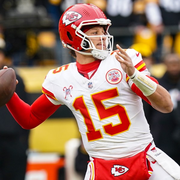 Kansas City Chiefs quarterback Patrick Mahomes (15) passes against the Pittsburgh Steelers during the first half of an NFL football game, Wednesday, Dec. 25, 2024, in Pittsburgh. (AP Photo/Matt Freed)