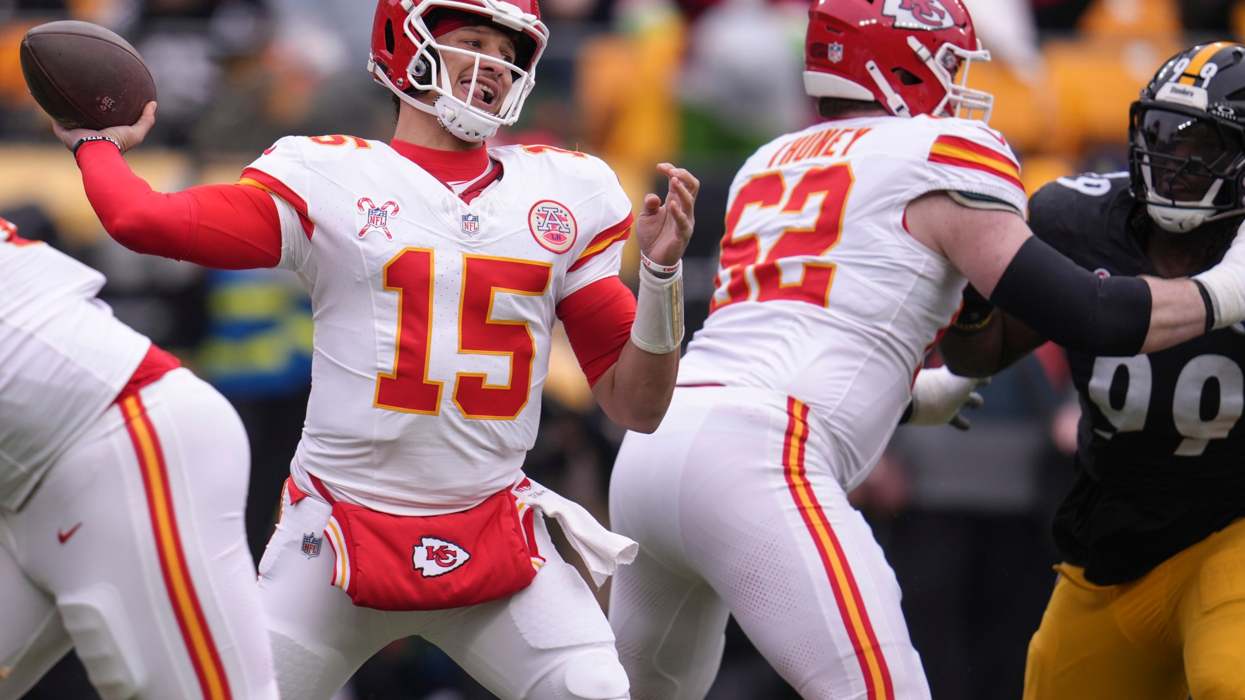 Kansas City Chiefs quarterback Patrick Mahomes (15) passes against the Pittsburgh Steelers during the first half of an NFL football game, Wednesday, Dec. 25, 2024, in Pittsburgh. (AP Photo/Gene J. Puskar)