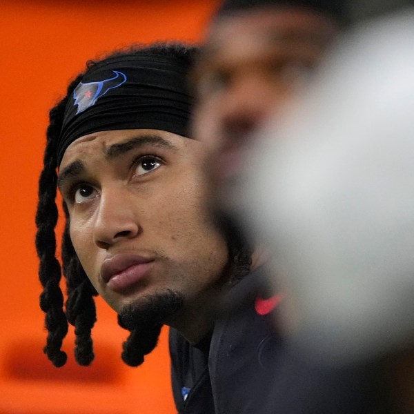 Houston Texans quarterback C.J. Stroud sits on the bench during the second half of an NFL football game against the Baltimore Ravens, Wednesday, Dec. 25, 2024, in Houston. (AP Photo/Eric Christian Smith)