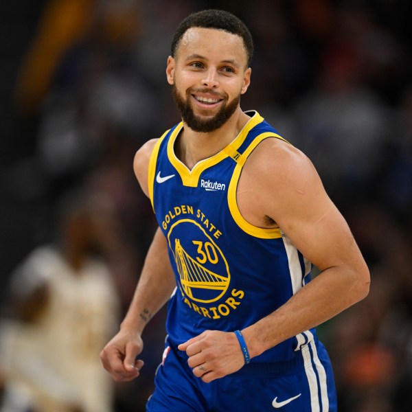 Golden State Warriors guard Stephen Curry (30) celebrates a three-point basket during the first half of an NBA basketball game against the Los Angeles Lakers, Wednesday, Dec. 25, 2024, in San Francisco. (AP Photo/Eakin Howard)