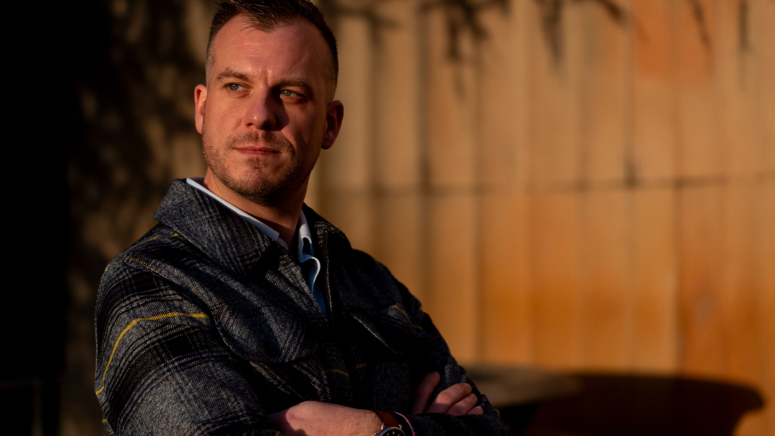 Recreational rugby player Sean McDowell, whose SafeSport case investigator Jason Krasley was fired after being arrested for stealing drug money in his previous job as a police officer, poses for a portrait Wednesday, Dec. 18, 2024, in Seattle. (AP Photo/Lindsey Wasson)