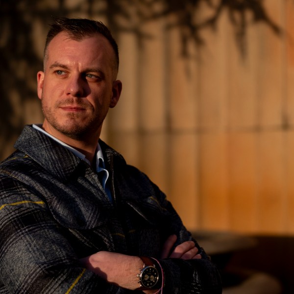 Recreational rugby player Sean McDowell, whose SafeSport case investigator Jason Krasley was fired after being arrested for stealing drug money in his previous job as a police officer, poses for a portrait Wednesday, Dec. 18, 2024, in Seattle. (AP Photo/Lindsey Wasson)