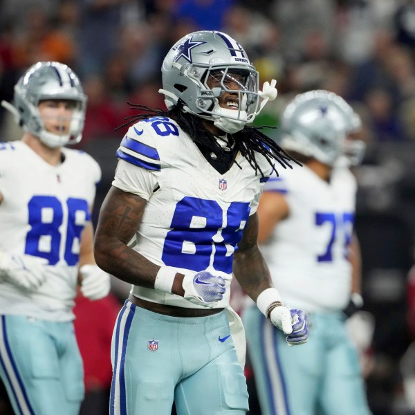 Dallas Cowboys wide receiver CeeDee Lamb (88) jogs to the sideline after making a catch inthe first half of an NFL football game against the Tampa Bay Buccaneers in Arlington, Texas, Sunday, Dec. 22, 2024. (AP Photo/Jeffrey McWhorter)