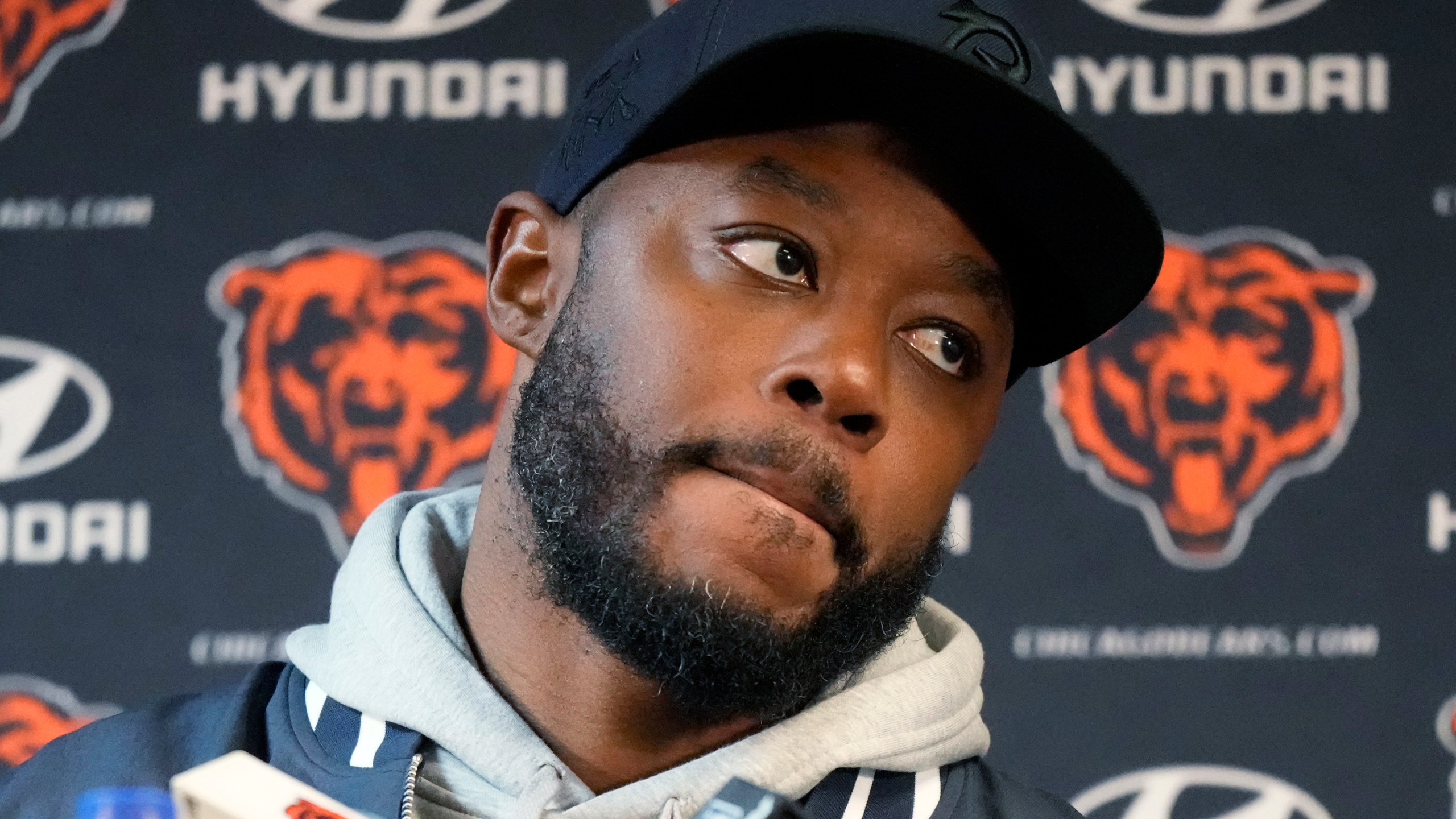 Chicago Bears interim head coach Thomas Brown listens to reporters after an NFL football game against the Seattle Seahawks, Thursday, Dec. 26, 2024, in Chicago. (AP Photo/Nam Y. Huh)