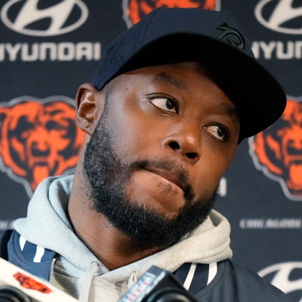 Chicago Bears interim head coach Thomas Brown listens to reporters after an NFL football game against the Seattle Seahawks, Thursday, Dec. 26, 2024, in Chicago. (AP Photo/Nam Y. Huh)