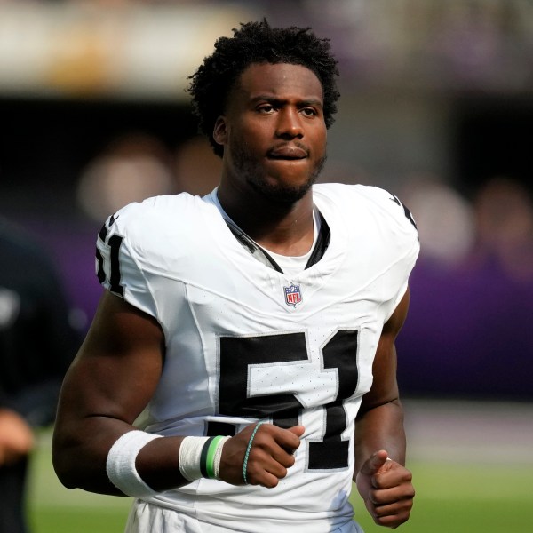 FILE - Las Vegas Raiders defensive end Malcolm Koonce (51) runs off the field at halftime of an NFL preseason football game against the Minnesota Vikings, Aug. 10, 2024, in Minneapolis. (AP Photo/Charlie Neibergall, File)