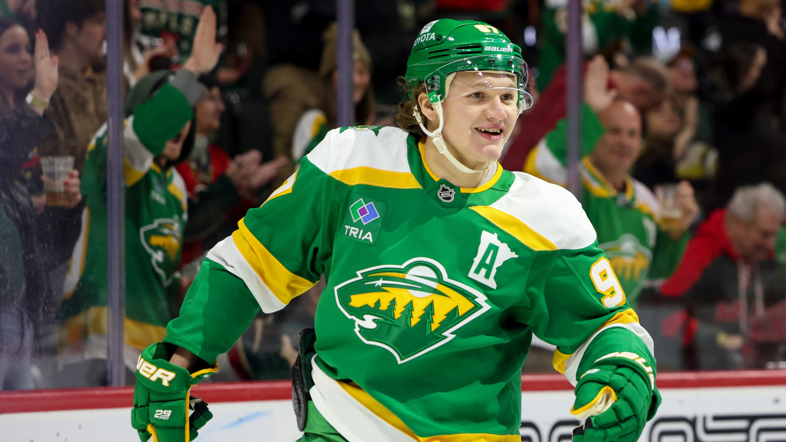 Minnesota Wild left wing Kirill Kaprizov (97) celebrates after scoring a goal during the first period of an NHL hockey game against the Chicago Blackhawks, Monday, Dec. 23, 2024, in St. Paul, Minn. (AP Photo/Ellen Schmidt)