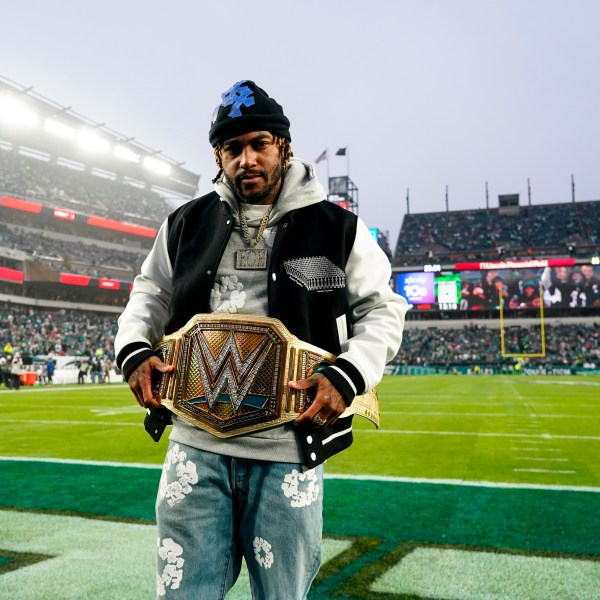 FILE -Former Philadelphia Eagles wide receiver DeSean Jackson poses with the WWE belt prior to an NFL football game between the Eagles and the San Francisco 49ers, Sunday, Dec. 3, 2023, in Philadelphia. (AP Photo/Chris Szagola, File)