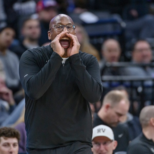 Sacramento Kings head coach Mike Brown shouts instructions from the bench during the second half of an NBA basketball game against the Denver Nuggets in Sacramento, Calif., Monday, Dec. 16, 2024. The Nuggets won 130-129. (AP Photo/Randall Benton)