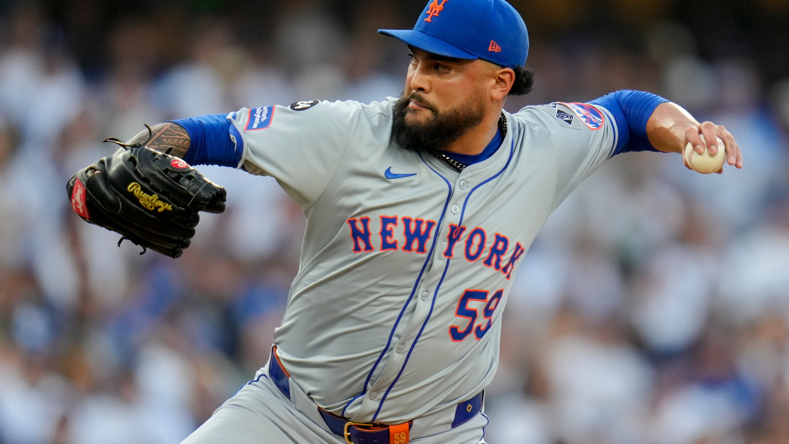 FILE - New York Mets pitcher Sean Manaea throws against the Los Angeles Dodgers during the first inning in Game 6 of a baseball NL Championship Series, Sunday, Oct. 20, 2024, in Los Angeles. (AP Photo/Julio Cortez, File)