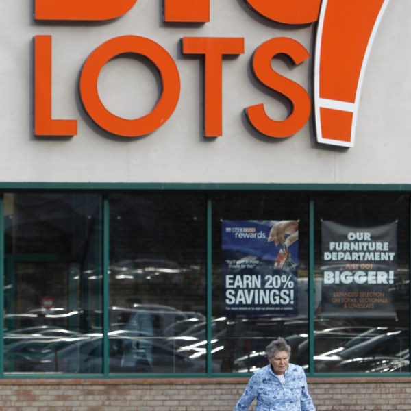 FILE - A shopper leaves the Big Lots store on Dec. 4, 2012 in Berlin, Vt. (AP Photo/Toby Talbot, File)