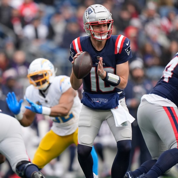 New England Patriots quarterback Drake Maye (10) looks to pass against the Los Angeles Chargers during the first half of an NFL football game, Saturday, Dec. 28, 2024, in Foxborough, Mass. (AP Photo/Robert F. Bukaty)