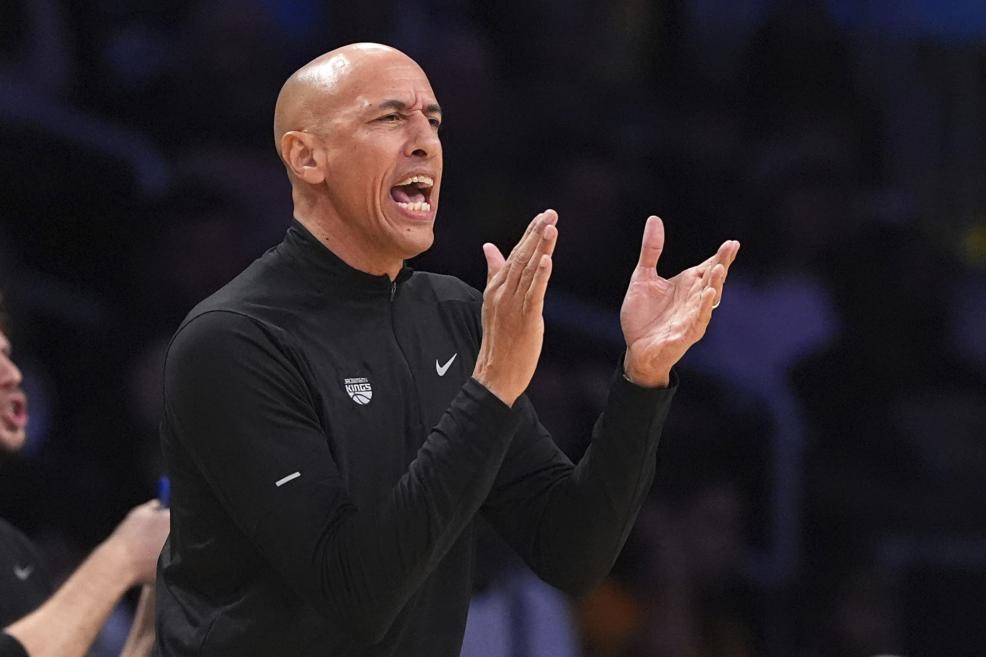 Sacramento Kings interim head coach Doug Christie claps during the first half of an NBA basketball game against the Los Angeles Lakers, Saturday, Dec. 28, 2024, in Los Angeles. (AP Photo/Mark J. Terrill)