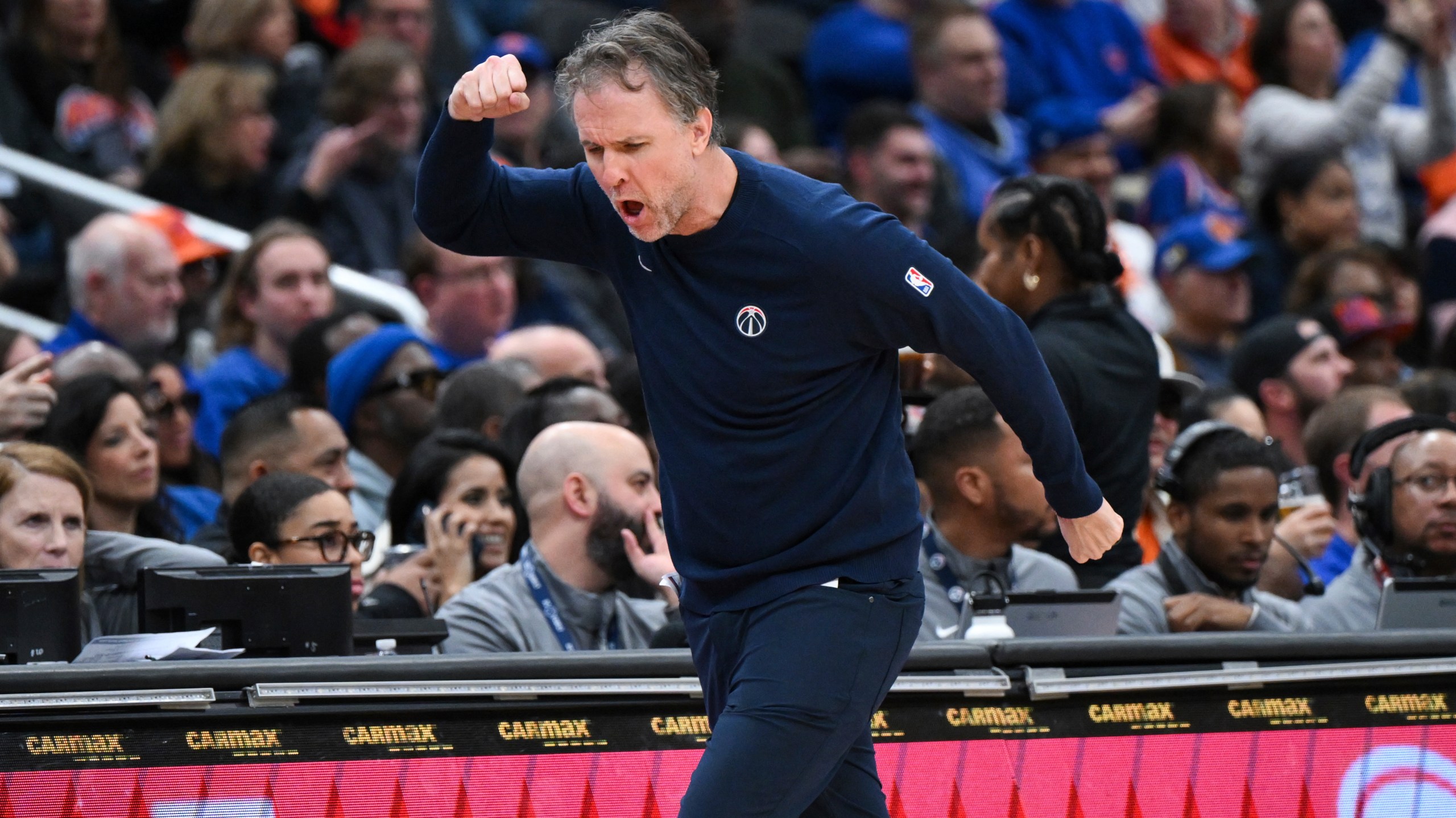 Washington Wizards head coach Brian Keefe reacts to a foul called against his team during the first half of an NBA basketball game against the New York Knicks, Saturday, Dec. 28, 2024, in Washington. (AP Photo/Terrance Williams)