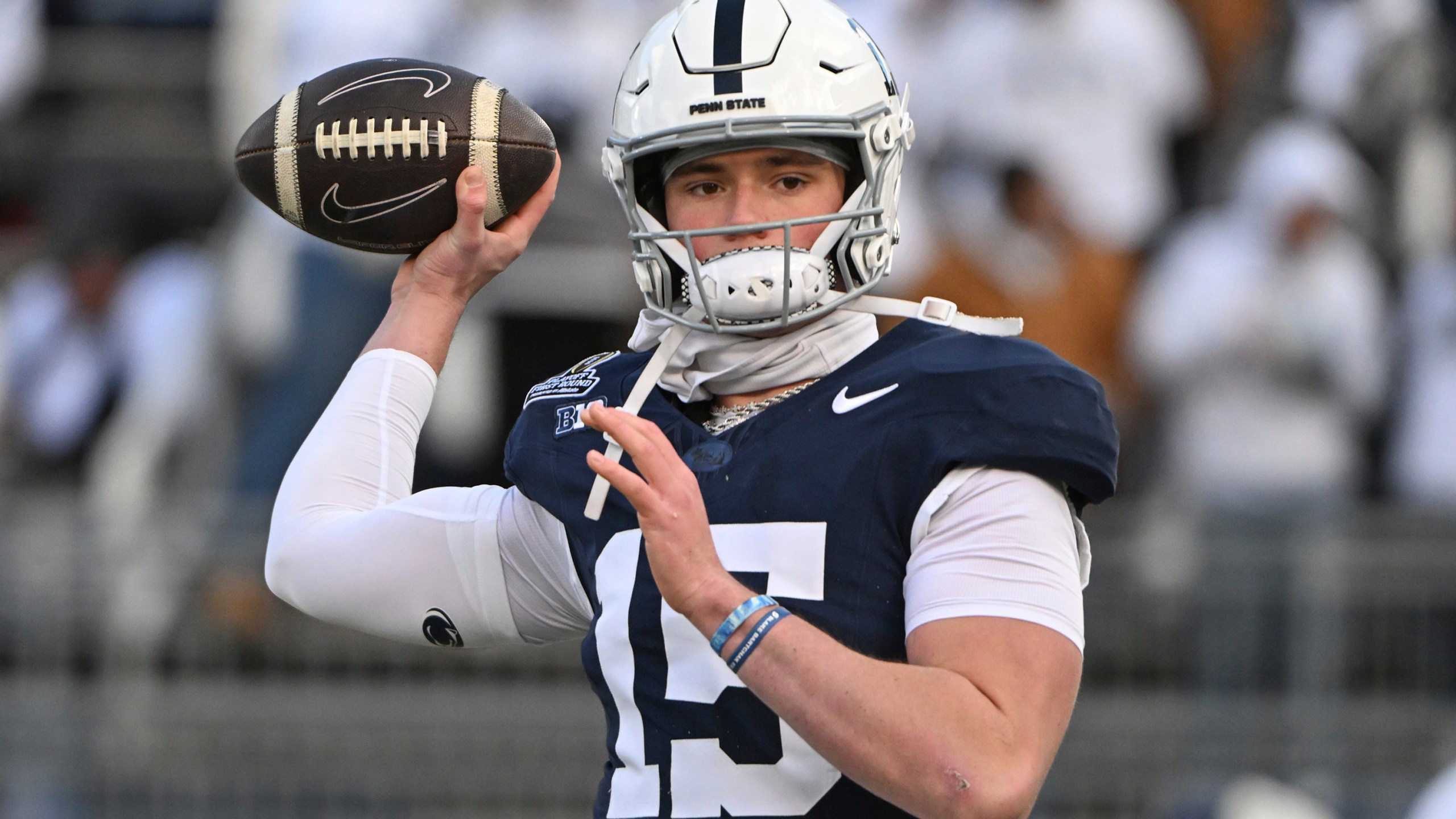 Penn State quarterback Drew Allar warms up for the game against SMU in the first round of the NCAA College Football Playoff, Saturday, Dec. 21, 2024, in State College, Pa. (AP Photo/Barry Reeger)